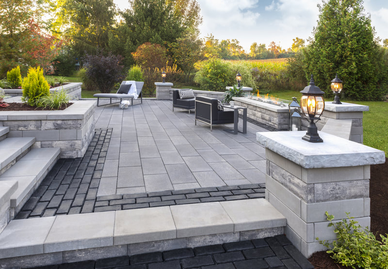 Custom patio, firepits, columns, walls, and landscaping